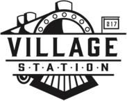 The Village Station logo